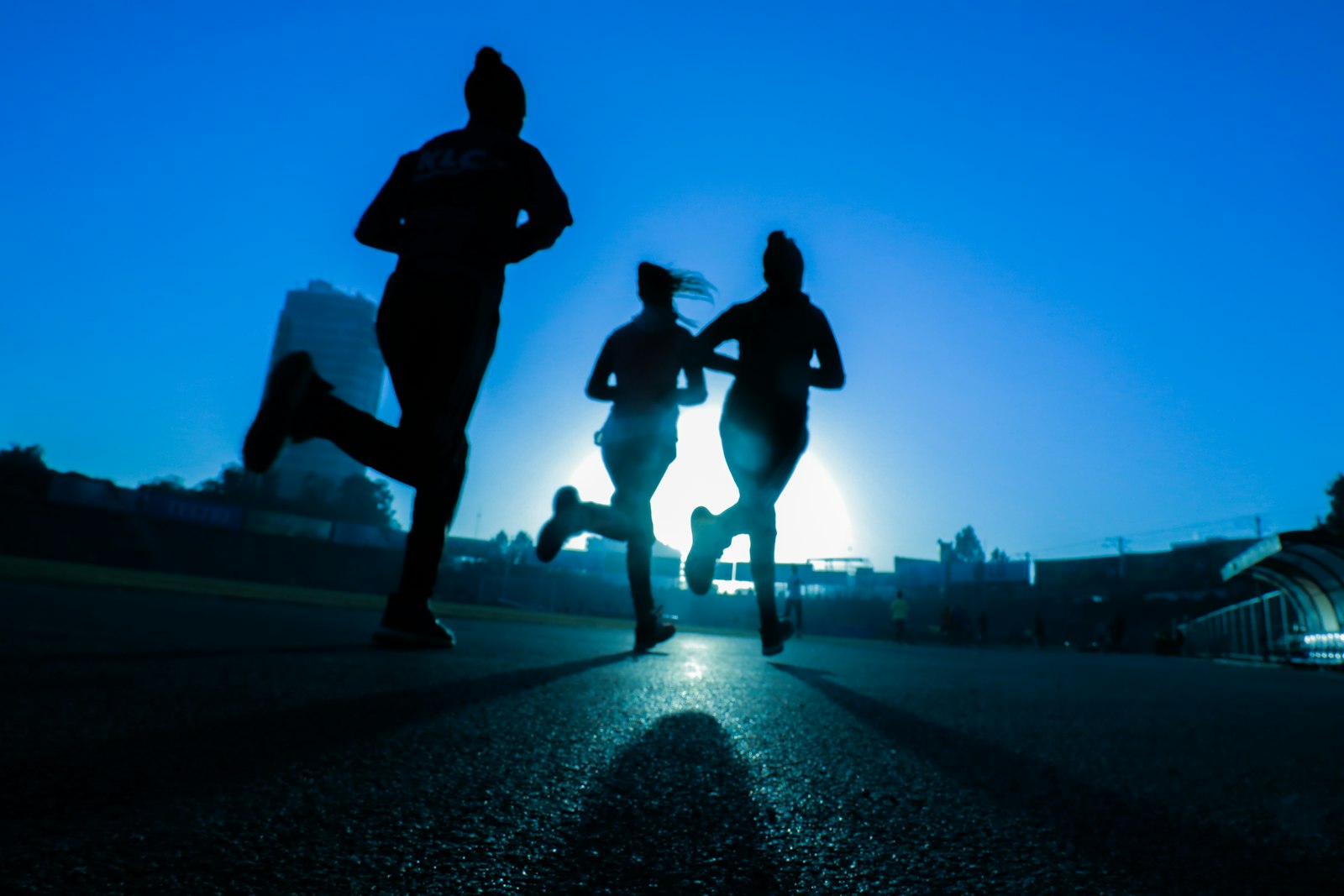 Runners at sunrise in the early years